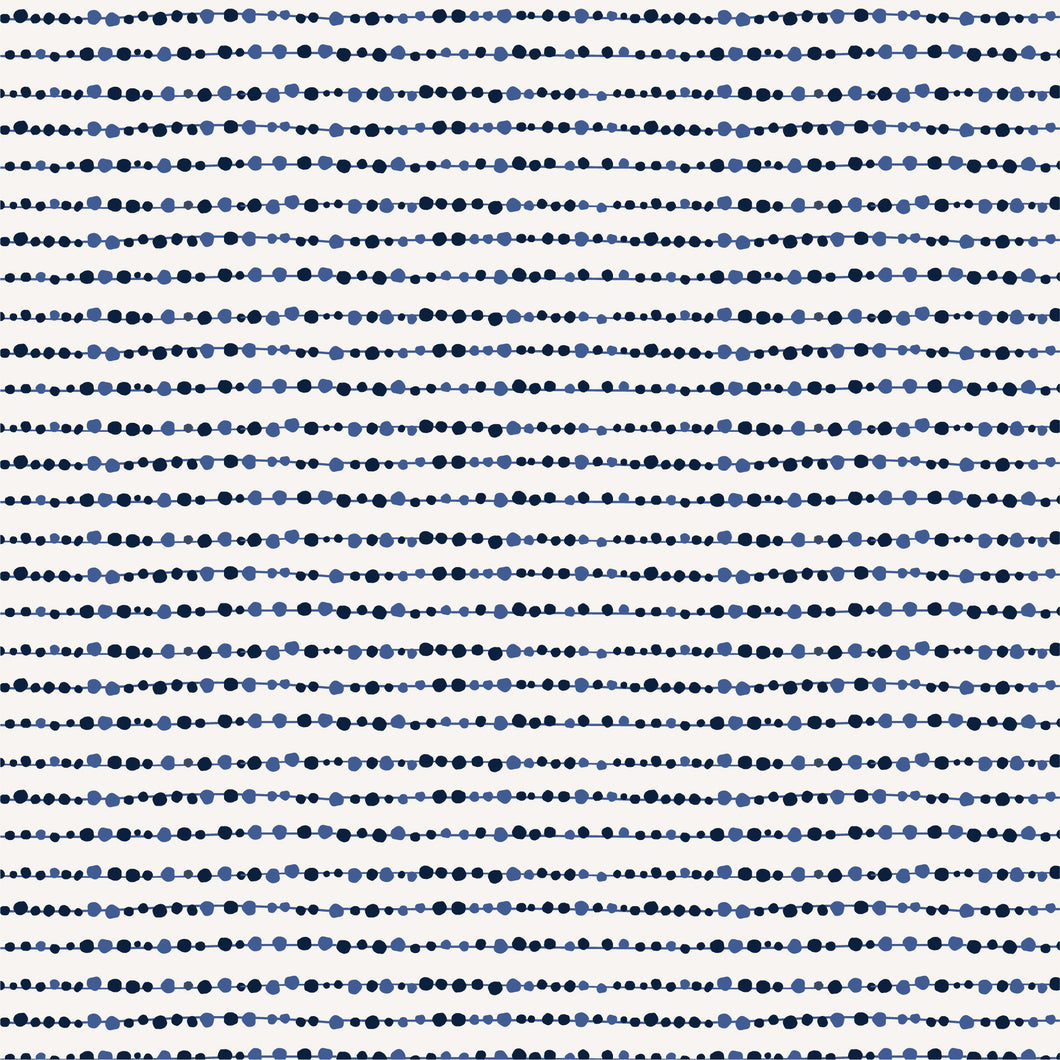 Navy blue and smoky blue dots lined up on a blue line.