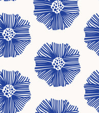 Load image into Gallery viewer, Resembling blue embroidered flowers on a white background.
